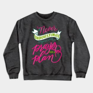 Never underestimate anyone with a prayer and a plan Crewneck Sweatshirt